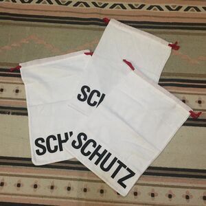 Three (3) Schutz white w/ black lettering soft material Dust bag 15” x 10”